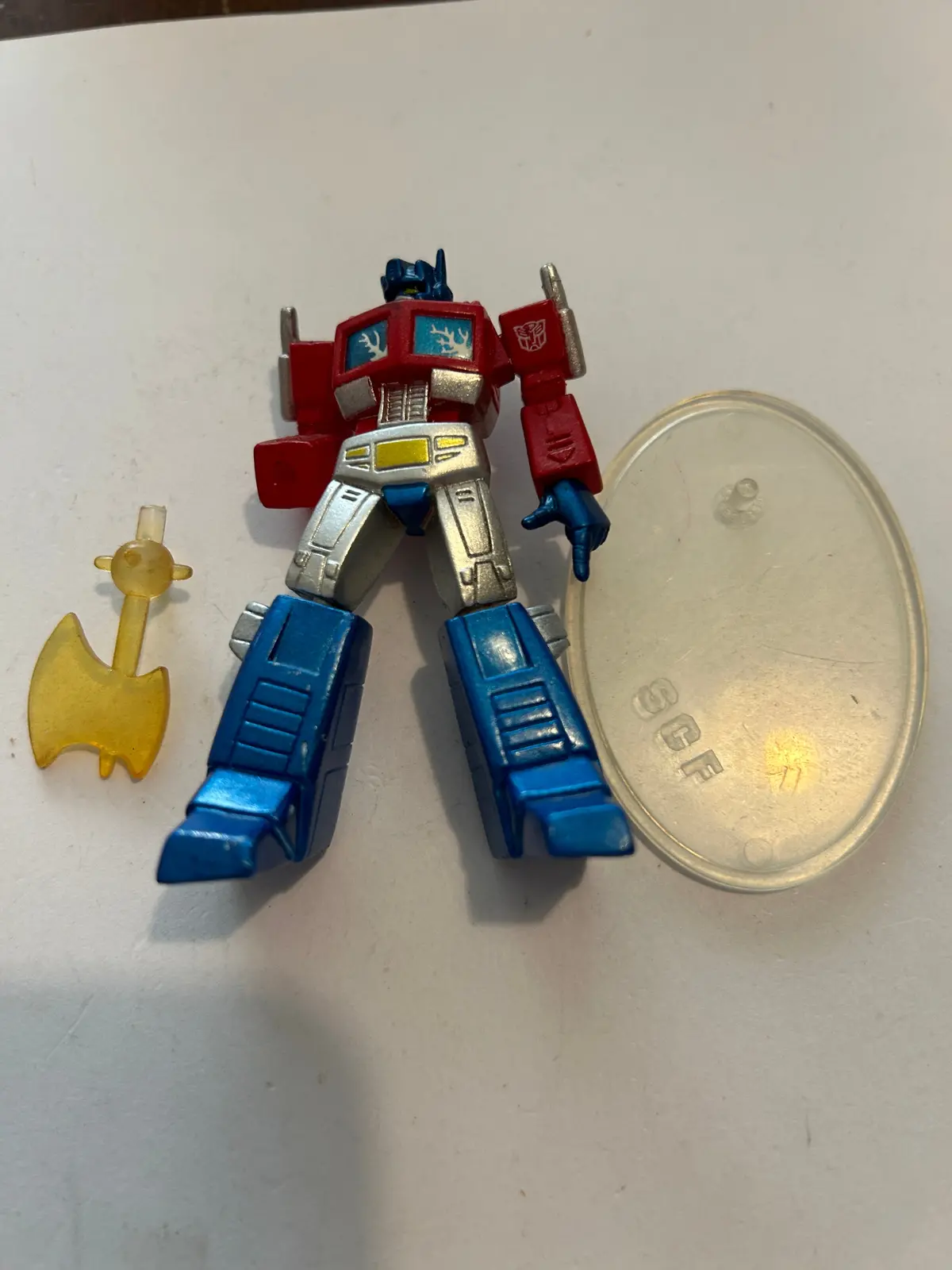 Tf Pvc Convoy W/ Energy Axe Metallic Color (Act 1) 1